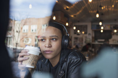 Young woman wearing headphones