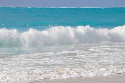 Waves splashing on rocks