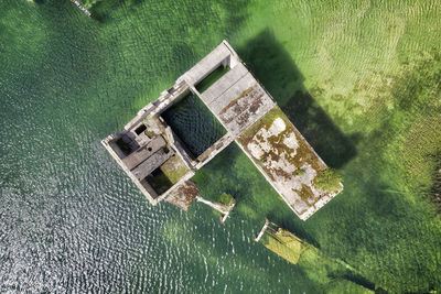 High angle view of abandoned floating on water