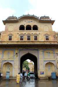 Group of people in front of historical building