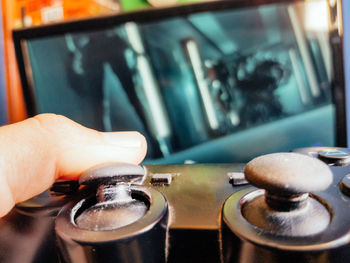 Close-up of hand holding drink