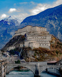 Bridge over buildings in city