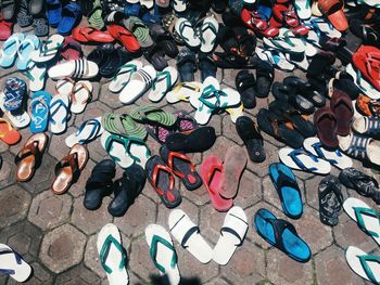 High angle view of footwear on walkway