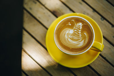 High angle view of cappuccino on table