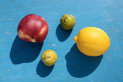 Close-up of fruits on a blue table