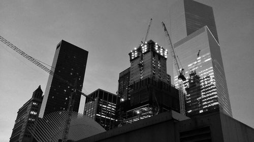 Low angle view of buildings against sky in city