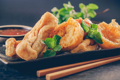 Close-up of food served on table