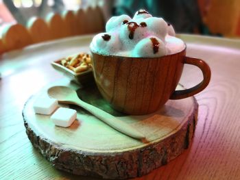 Close-up of coffee cup on table