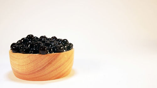 Close-up of cake against white background