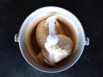 Directly above shot of ice cream in bowl on table