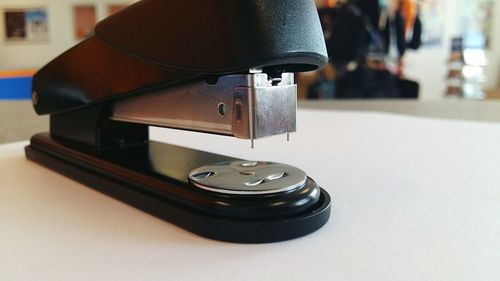 Close-up of black stapler