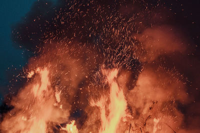 Firework display at night