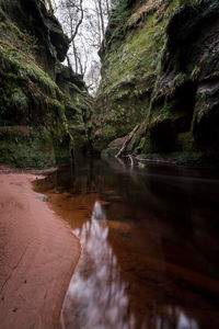 Lake against rock formations