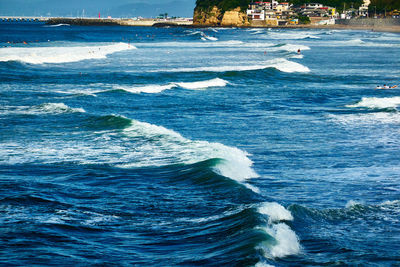 Scenic view of sea with rushing waves