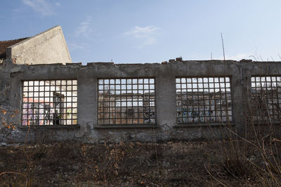 Abandoned building against sky