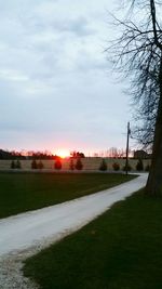 Scenic view of landscape against cloudy sky