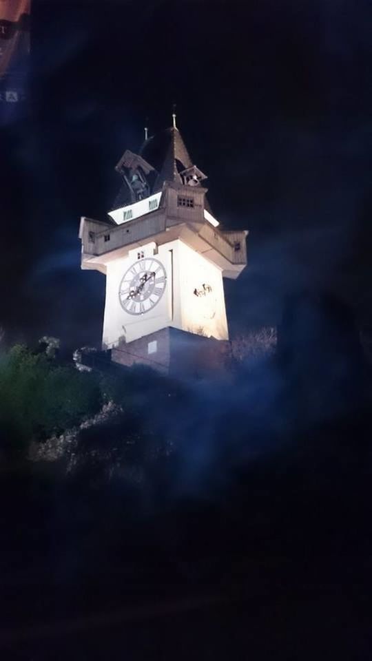 LOW ANGLE VIEW OF CLOCK TOWER WITH CLOCK