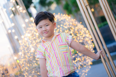 Portrait of girl standing outdoors
