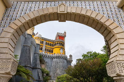 An archway at the entrance of the pena national palace, sintra, portugal