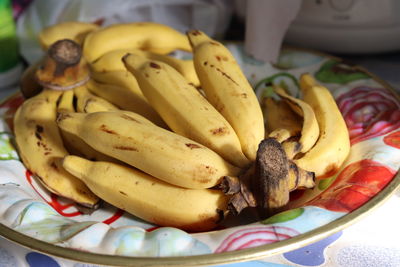 High angle view of fruits in plate on table