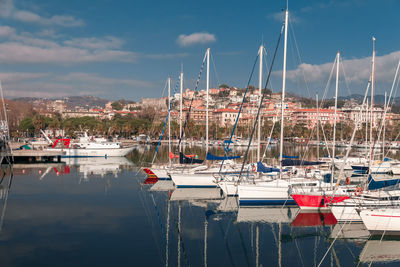 Boats moored in harbor