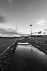 Road on field against sky