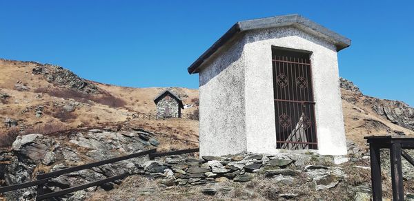 Old building against clear blue sky