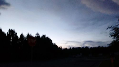 Silhouette of trees against sky