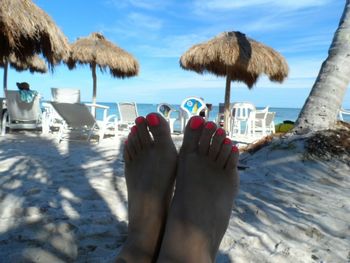 People relaxing on shore