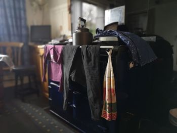 Close-up of wine bottles on table at home