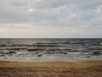 Scenic view of beach against sky