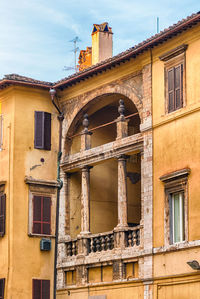 Low angle view of old building against sky