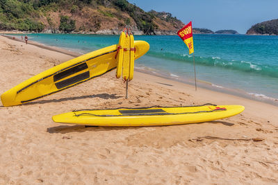 Yellow umbrella on beach