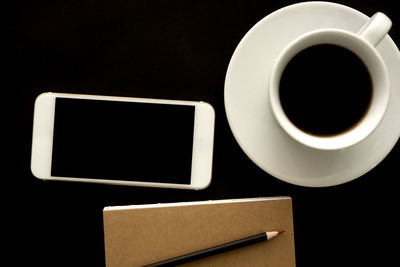 Directly above shot of black coffee on table