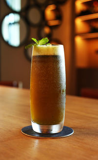 Close-up of beer in glass on table