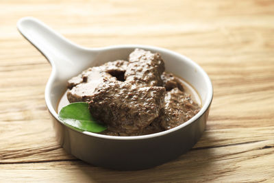 Empal daging kelem, traditional beef stew from central java, indonesia. made from beef, coconut milk