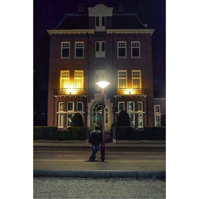 building exterior, architecture, built structure, city, street, men, illuminated, night, walking, lifestyles, city life, street light, building, transfer print, person, full length, rear view, auto post production filter