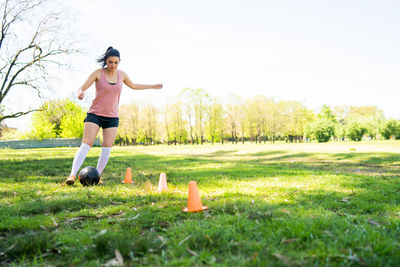 Full length of woman on field against sky