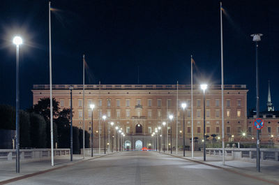 Illuminated street lights at night