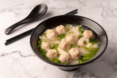 High angle view of rice in bowl on table