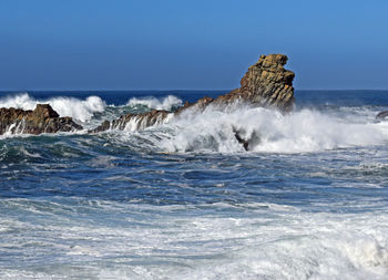 Wave in sea against clear sky