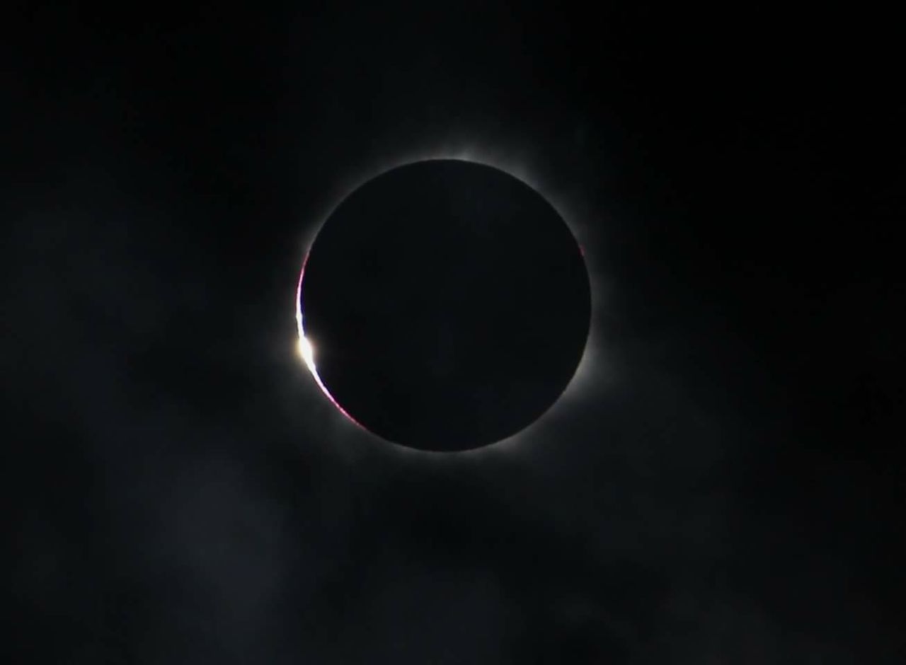 CLOSE-UP OF MOON OVER DARK SKY