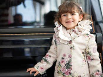 Portrait of cute girl smiling