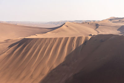 Scenic view of desert against sky