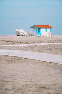 Blue beach hut by the sea