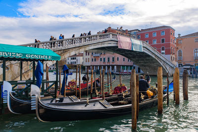 View of boats moored in canal