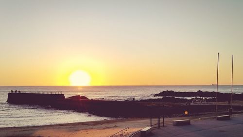 Scenic view of sea at sunset