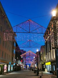 Illuminated street light at night