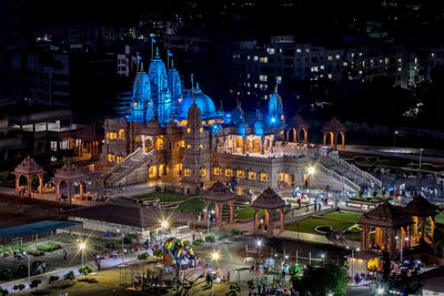 High angle view of illuminated buildings at night