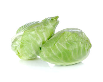 Close-up of green pepper against white background